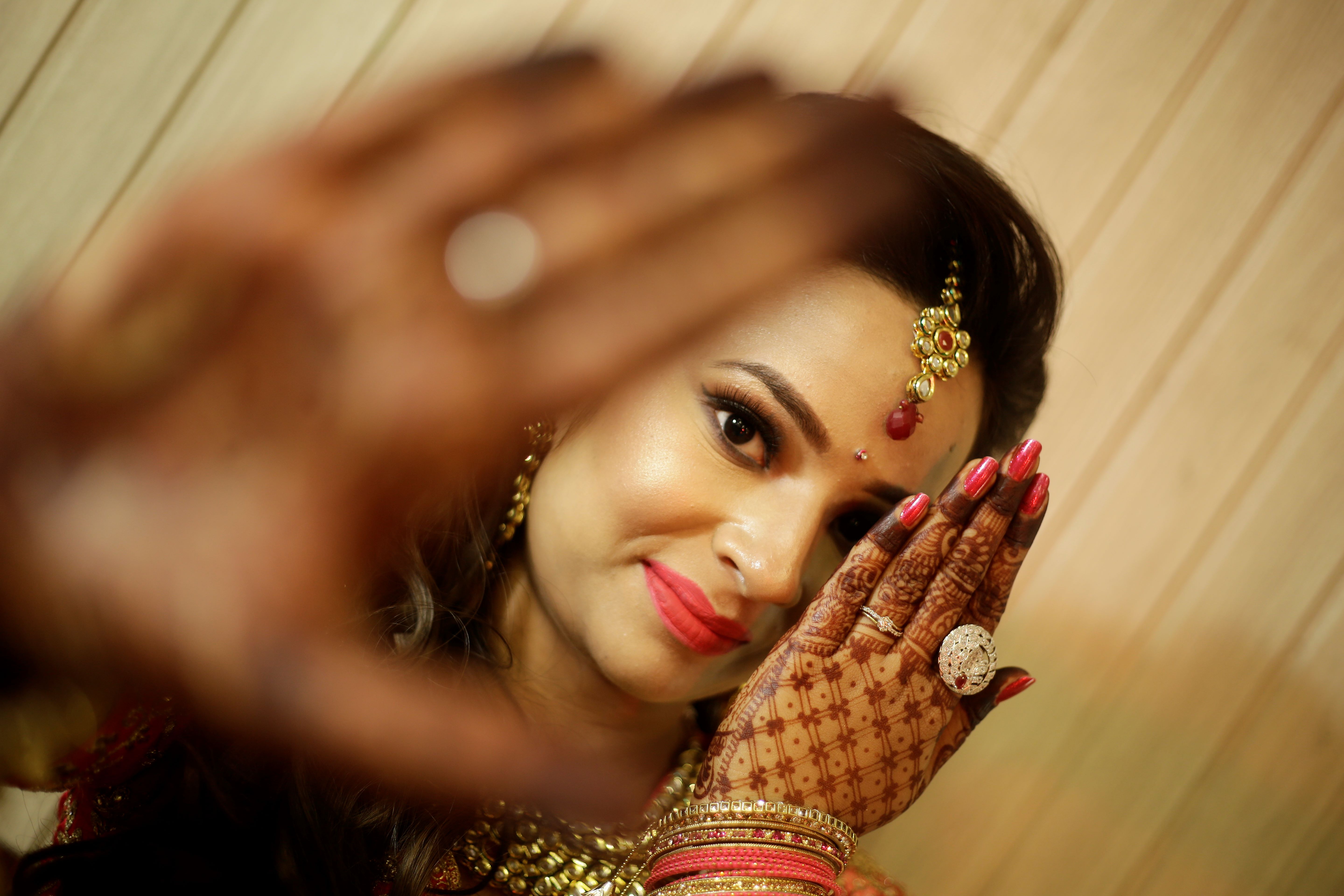 Close up Wedding rings gleam against a backdrop of red roses and candles AI  Generated 29321533 Stock Photo at Vecteezy